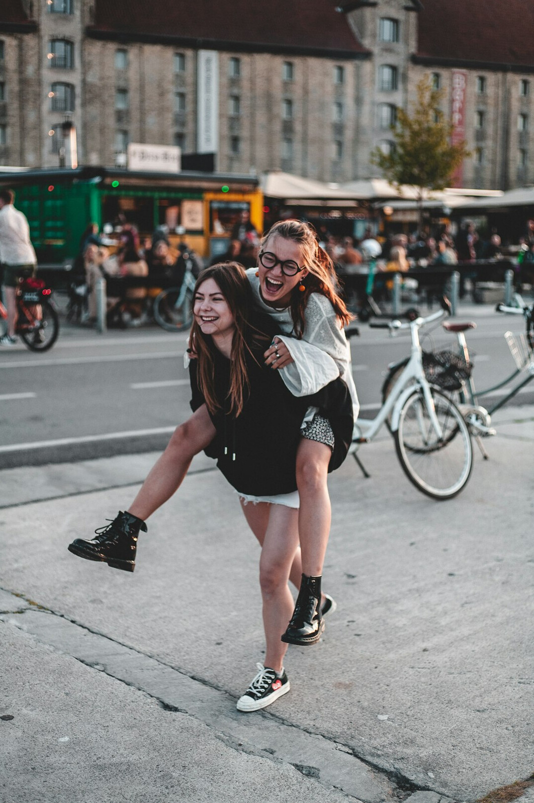 Children playing and laughing at a local summer festival in Denmark